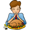 Boy praying before Thanksgiving meal