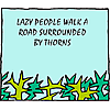 Lazy people walk a road surrounded by thorns